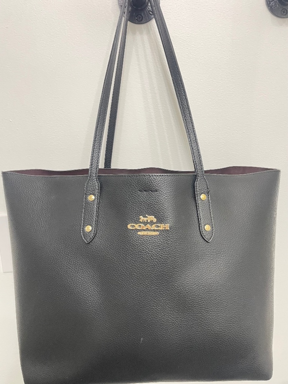 Black leather Coach tote